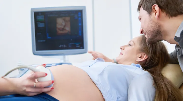 Who is the sonographer, and what do they do?